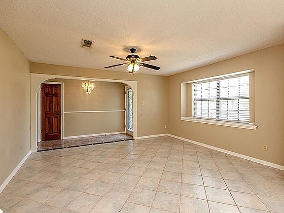 FORMAL AREA OR SECOND LIVING AREA WITH EXTENSIVE TILE FLOORING ~