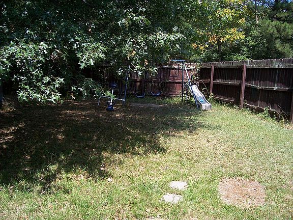 PRIVATE FENCED BACKYARD