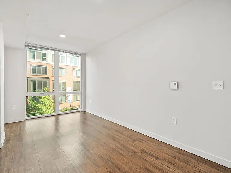 Niwa Apartments | Modern City Living in Queen Anne | Furnished Units & Move in Specials! — Photo 46