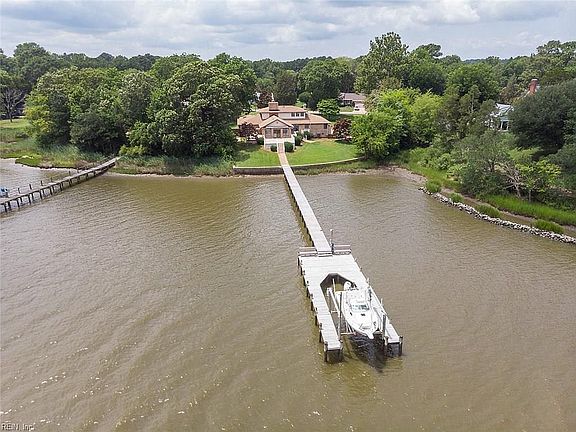 Deep water on the Elizabeth River in Western Branch. Concrete bulk head, pier and dock offer boat lift, water and electricity.