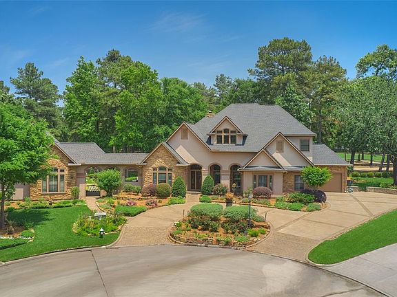 Spacious cul-de-sac lot with circle driveway, extra parking and impeccable landscaping. Instant curb appeal from the moment you arrive.