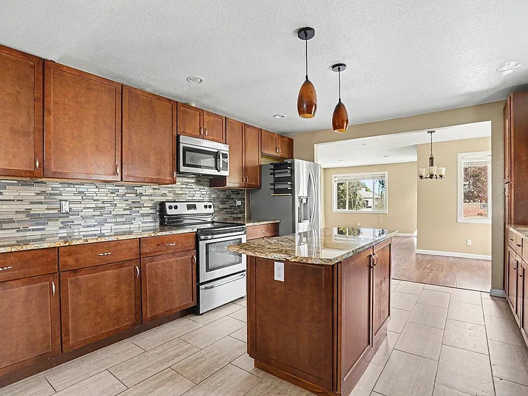 5045 Eliot St — Photo 2