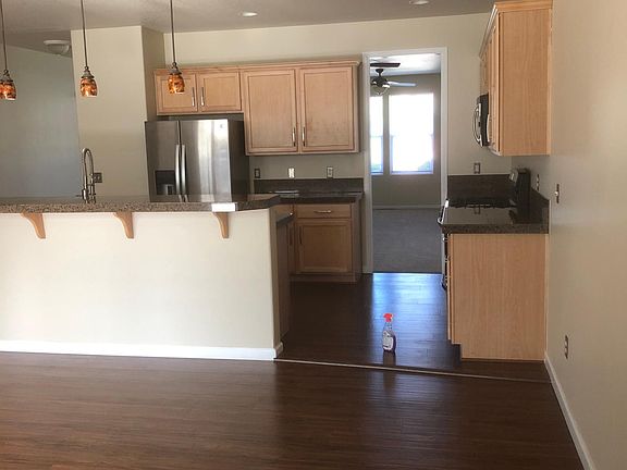 Family Back Towards Kitchen