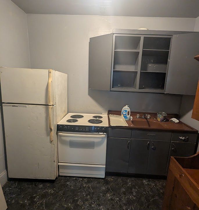 Current kitchen - will be updated with new appliances, new cabinets, and new granite counters!