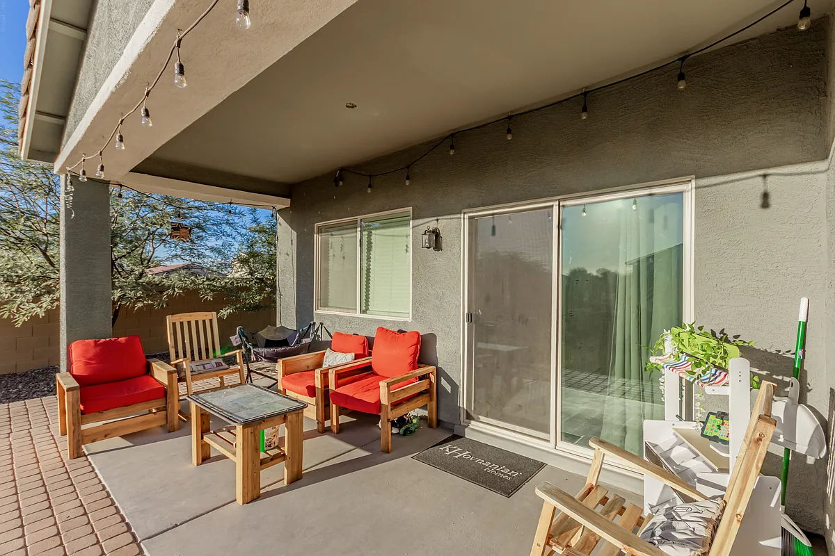 Backyard patio- minus furniture, make it your own. - 915 E Ruby Ct