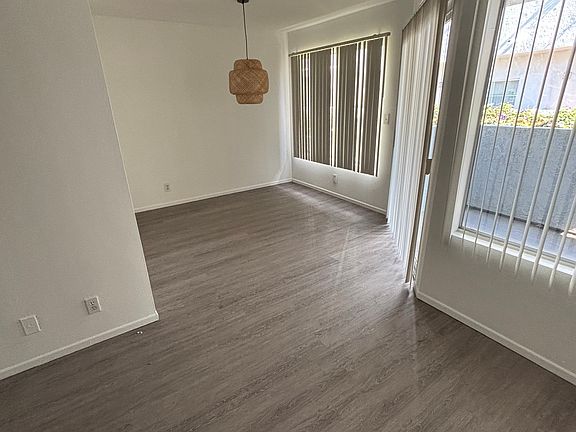 Dining Area and window looking out to the balcony.
