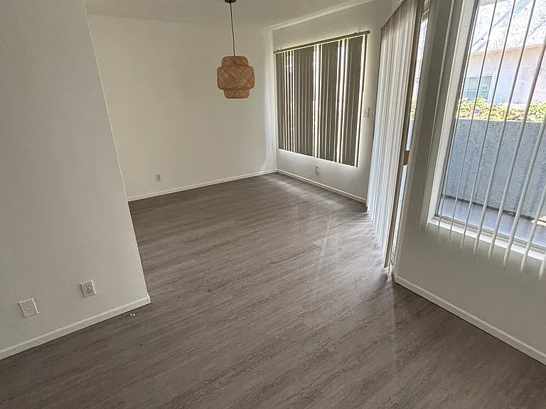 Dining Area and window looking out to the balcony.