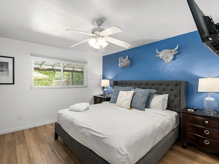 Master bedroom with king size bed and private bathroom
