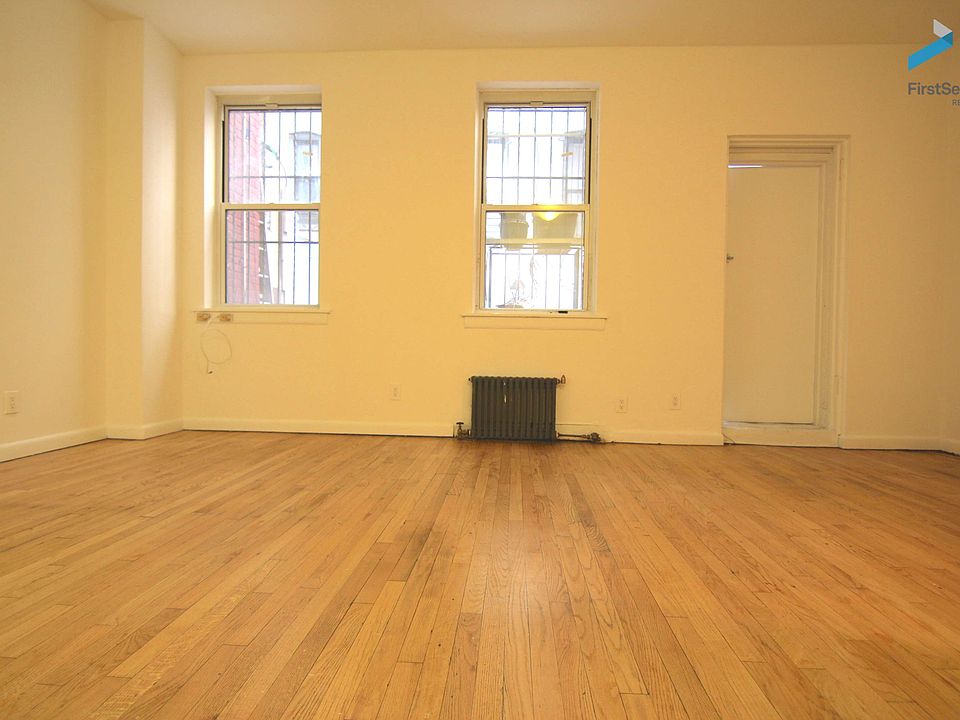 1st image of 303 E 12th St APT 1A