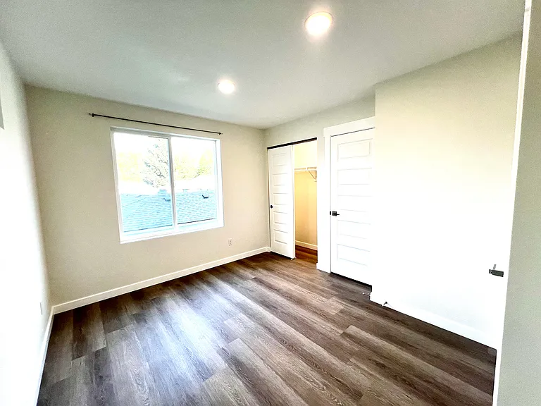 Front bedroom from corner.