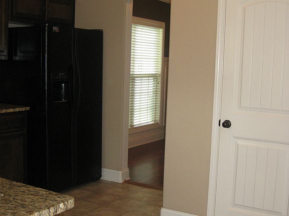 Kitchen opens to dining room