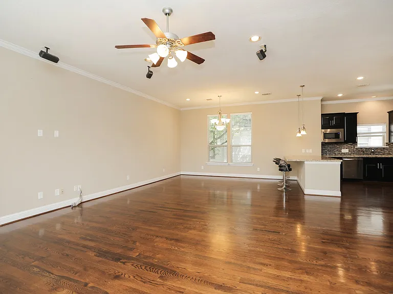 Living room on second floor with beautiful hardwood floors