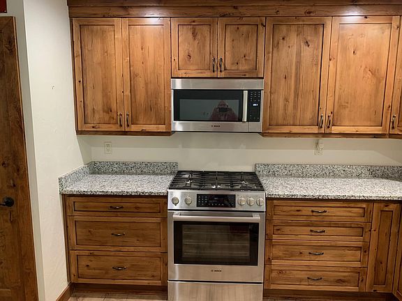 Bosch dual fuel range and Bosch microwave / hood.