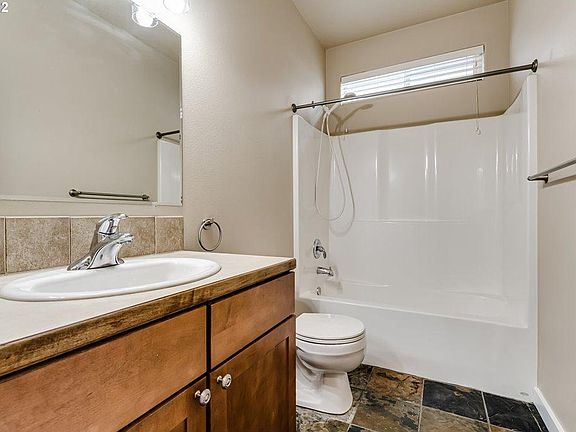 downstairs full bath with tub