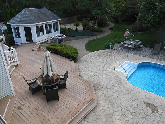 Back Yard Ariel View : Trex deck, stamped concrete patio, and cabana house with bar