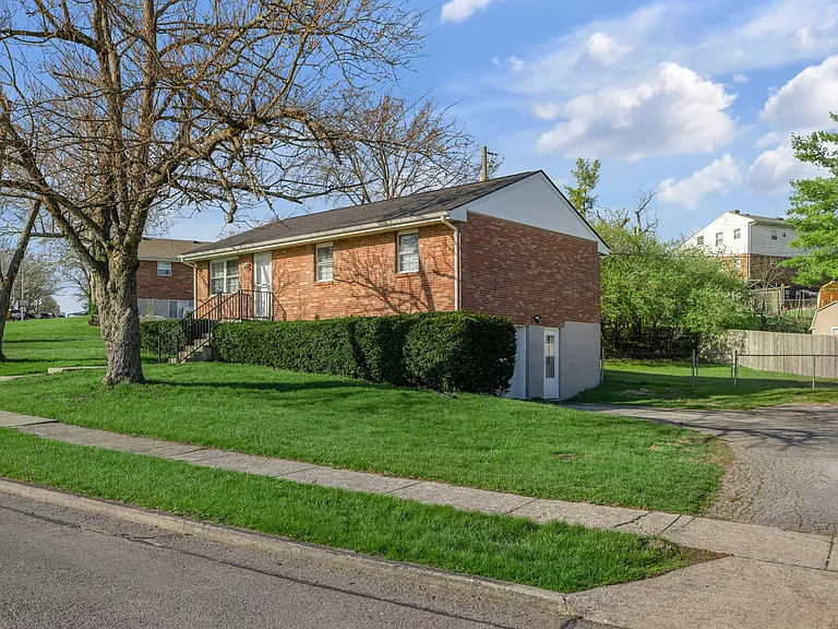 Large Parking area beside house.