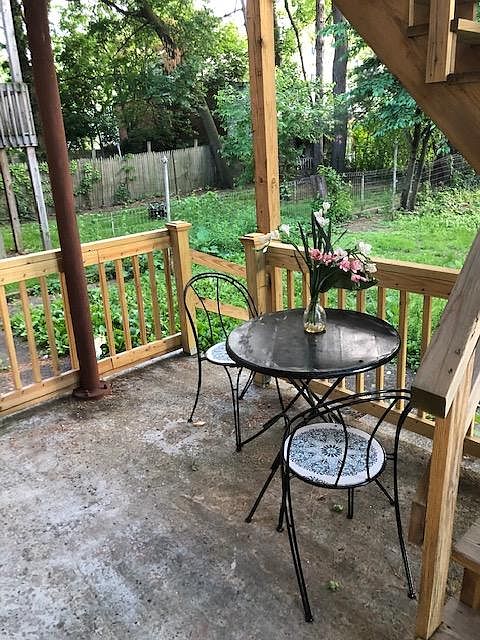 Private back porch and access to large flat back yard