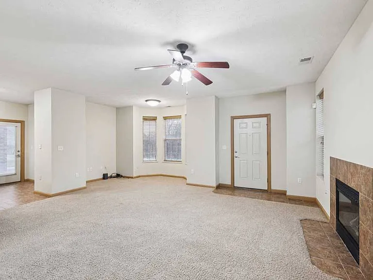 Spacious living areas create a comfortable place to relax, gather with friends, or enjoy a quiet evening by the fireplace.