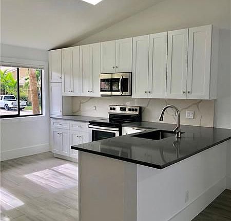 4th image of 9941 61st Way S