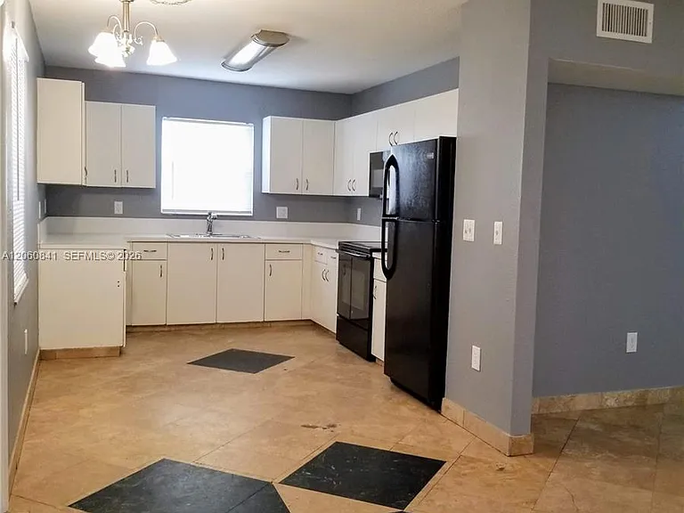 2761 NW 6th St — Photo 7