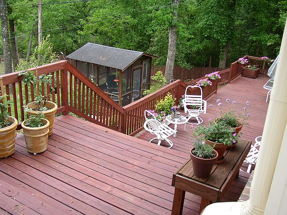 view 1 of deck - from top looking down towards screened house