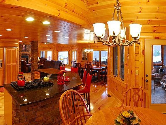 Hickory hardwood floors, hickory cabinets, granite countertops, stone island