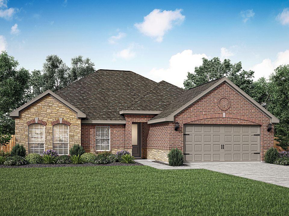 The Hendrie is a single story home with brick and stone
