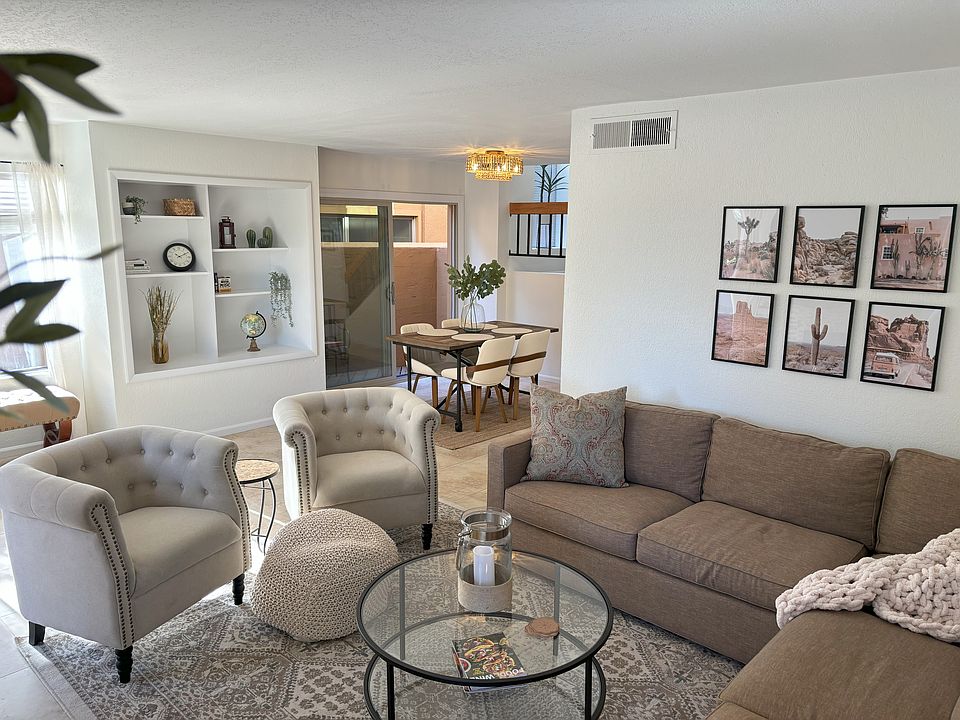 Living room with smart TV over fireplace
