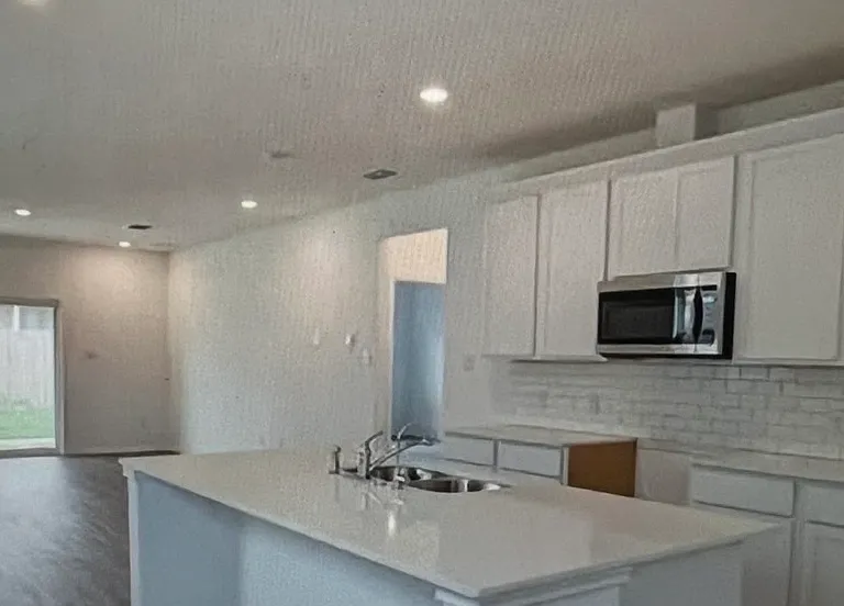 Kitchen looking to living room, open concept