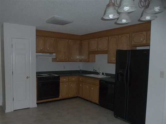Kitchen with black appliance