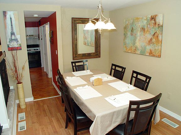 Formal dining room with laminated flooring