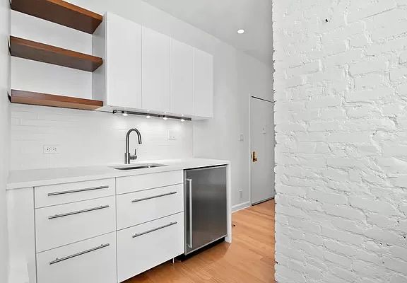 2nd image of 311 E 3rd St APT 18
