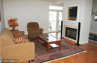 Living room w/double-sided fireplace!
