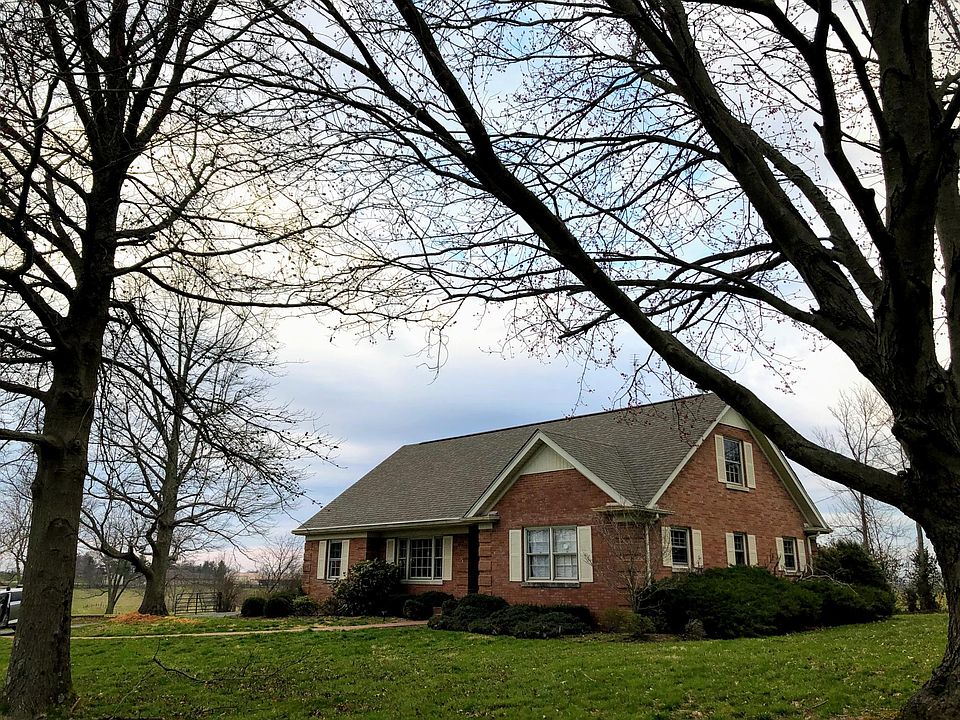 Red brick, 2-story farmhouse. Lots of windows, closet and storage space. Hardwood floors throughout.