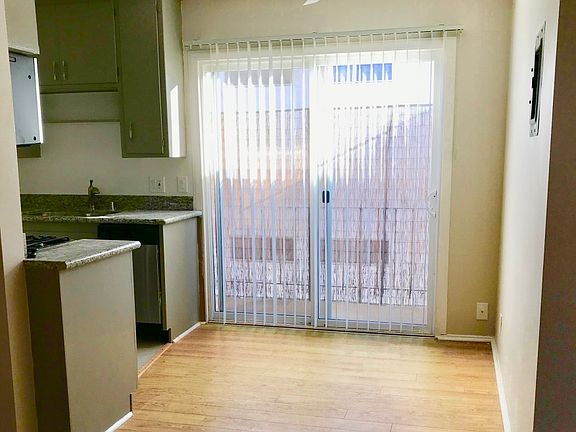 Separate Dining Room with Sliding Doors to Balcony.