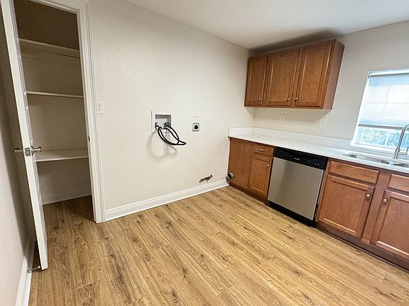 Built-in pantry and W/D hookups in kitchen. Option for new W/D installed +$50/month!