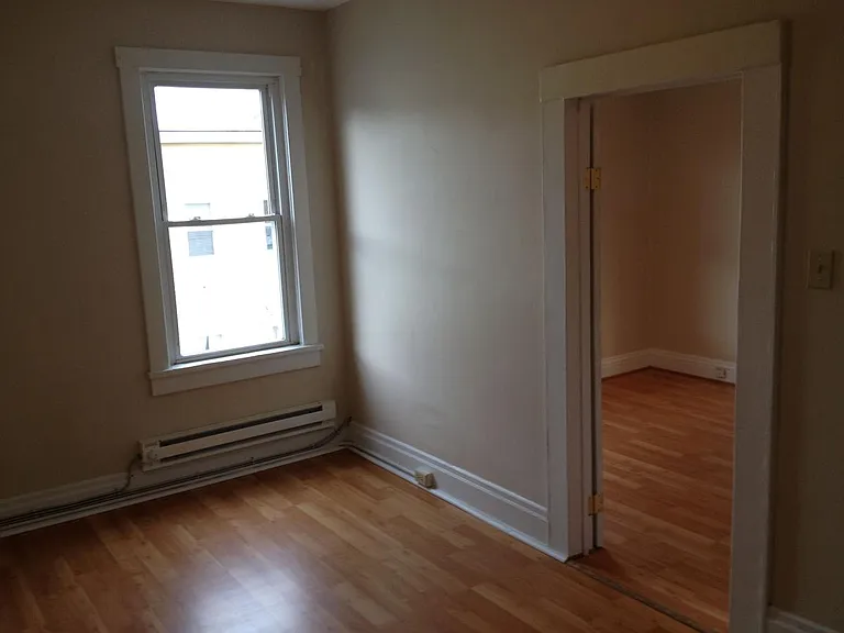 Bedroom w/view into breakfast nook