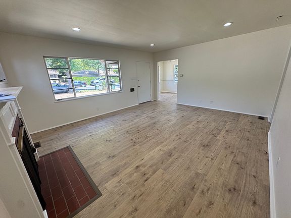 Living room with Fireplace separate angle