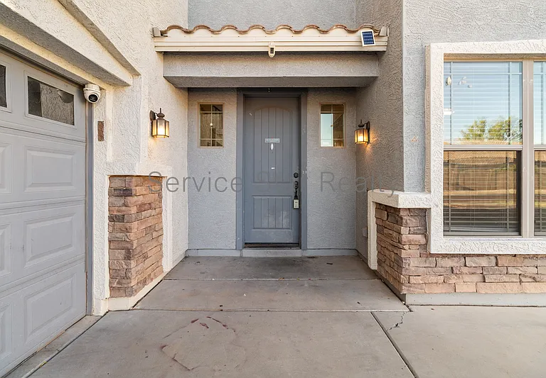 10122 W Albeniz Pl — Photo 3