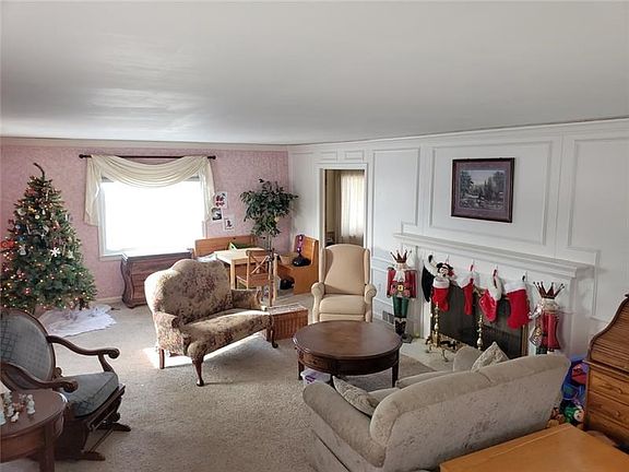 Plenty of room for your next family gathering. The formal living room has plenty of charm and light.