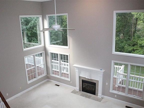 Stunning great room with walls of windows