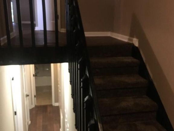 Entrance foyer. Upstairs for entertaining (kitchen, living room, 1/2 bath, patio). Downstairs for living (2 bedrooms, full bath (detached), laundry, utilities)