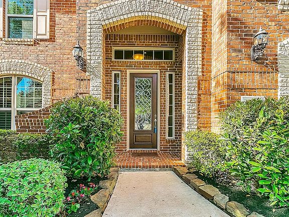Inviting front porch with traditional charm.