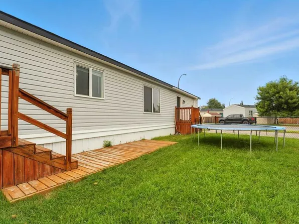 113 Heritage Dr, Okotoks, AB T1S 1M4