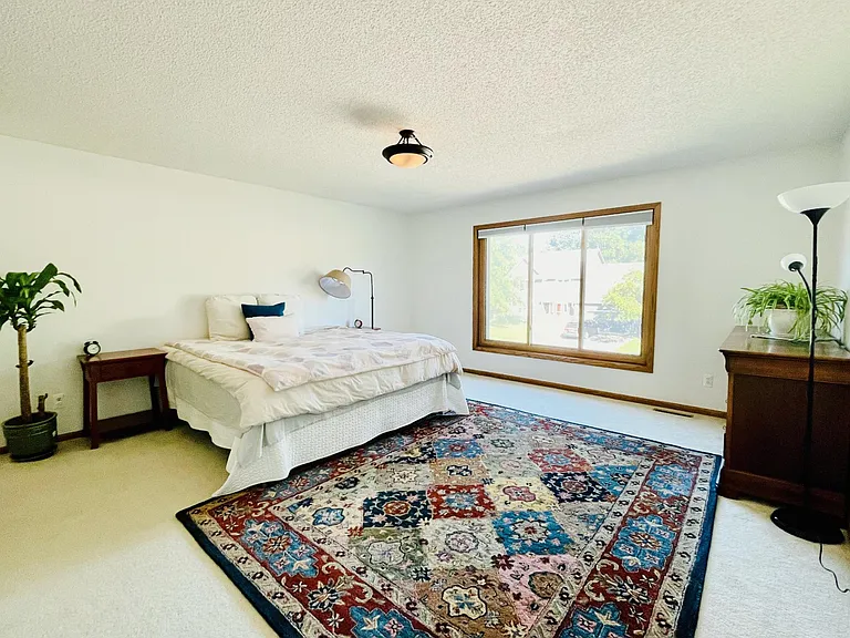 Spacious Master Bedroom with Beautiful Morning Sunlight