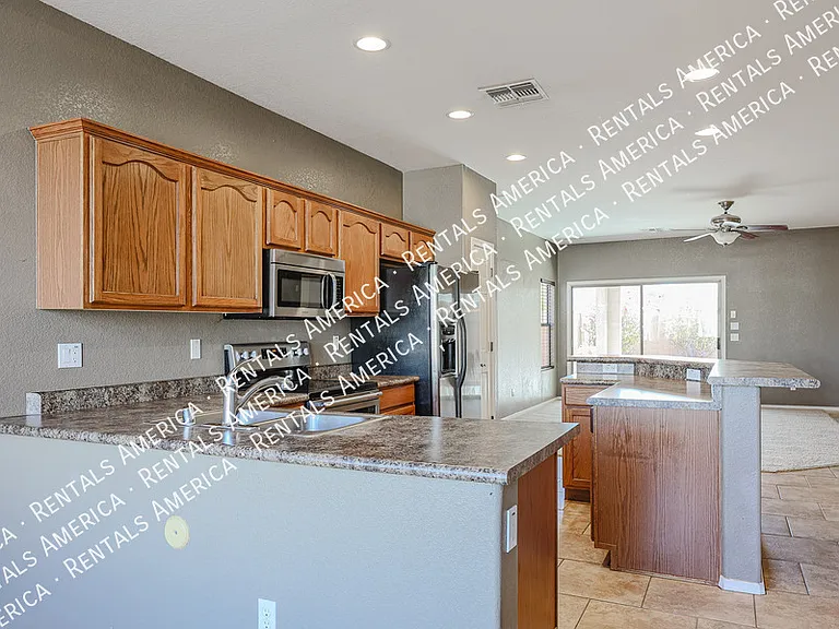 12823 W Modesto Dr — Photo 11