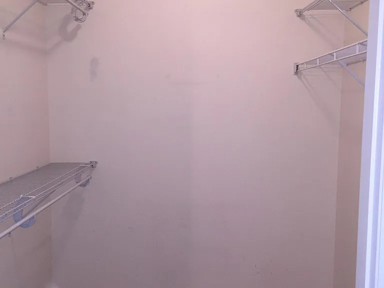 Large walk-in closet in primary bedroom