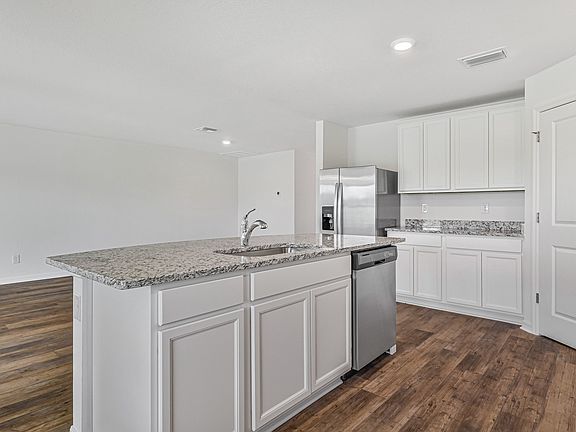 The Capri comes with a kitchen island that is ready to be the heart of your home