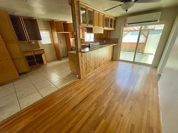 Dining Room with ceiling fan and mini split AC.