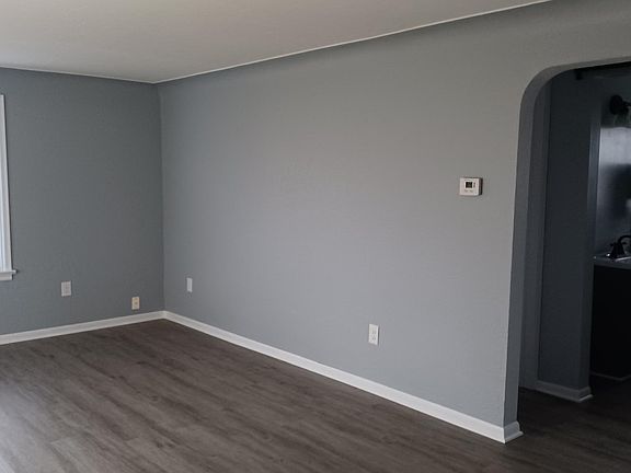 Large living room. All new luxury vinyl flooring through out the home.
